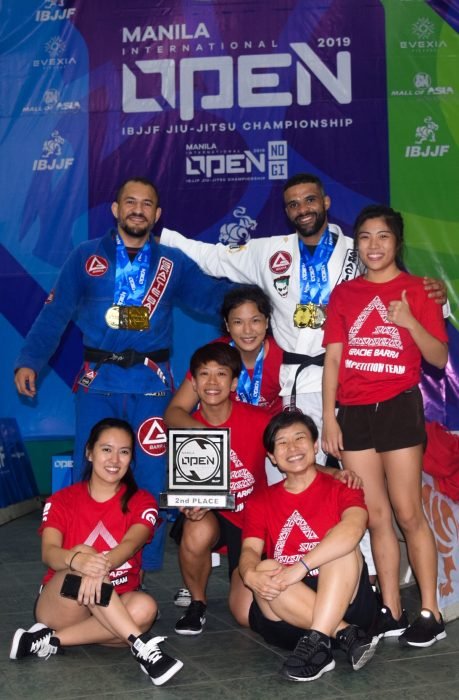 Some of the lovely BJJ ladies of Gracie Barra Singapore and our professors!